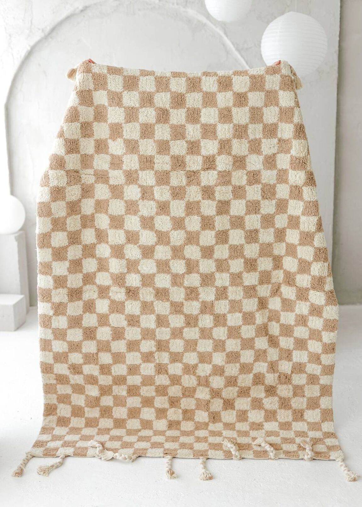 Why the Checkered Rug Trend Is the Bold Neutral Your Home Needs